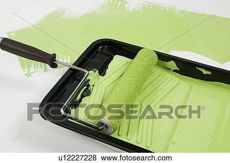 Stock Photo - Paint roller and tray, Canada, British Columbia. Fotosearch