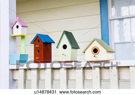 Variety of bird houses View Large Photo Image Stock Image - Variety of bird houses. Fotosearch