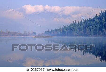 One Mile Lake, near Pemberton, BC in early morning mist View Large Photo Image Stock Photo - One Mile Lake, near Pemberton, BC in early morning mist. Fotosearch