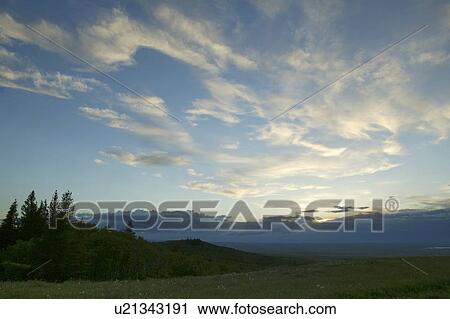 Stock Image - Sunset at Cypress Hills Interprovincial Park, Saskatchewan, Canada. Fotosearch
