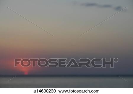 Stock Image - Sunset, Clear Lake; Canada, Manitoba, Riding Mountain National Park. Fotosearch