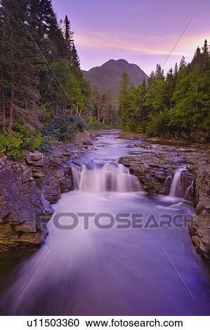 Stock Image - View of Cap-Chat river and Mont Frère du Nicol-Albert, Quebec. Fotosearch