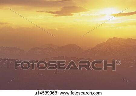 Orange clouds over Coast Mountain Range at sunset, summer View Large Photo Image Stock Photo - Orange clouds over Coast Mountain Range at sunset, summer. Fotosearch