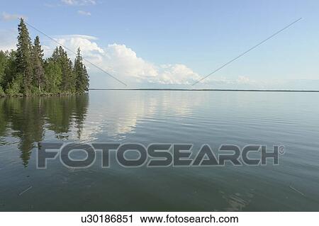 Reflection in Clear Lake, Riding Mountain National Park, Manitoba, Canada View Large Photo Image Stock Image - Reflection in Clear Lake, Riding Mountain National Park, Manitoba, Canada. Fotosearch