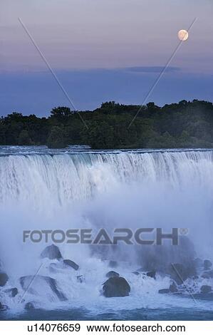 The American Falls at dusk with full moon - Niagara Falls -New York USA View Large Photo Image Stock Photo - The American Falls at dusk with full moon - Niagara Falls -New York USA. Fotosearch