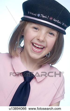 Stock Photograph - 5 year old girl wearing beret and tie. Fotosearch