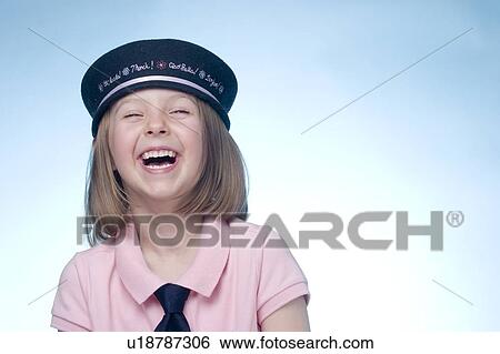 Stock Photograph - 5 year old girl wearing beret and tie. Fotosearch