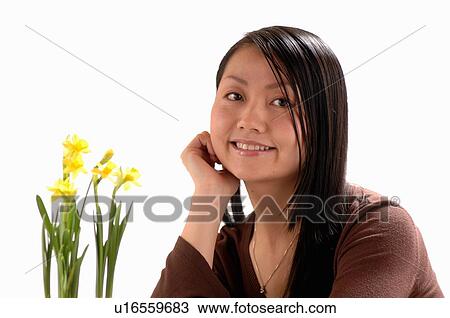 Asian Young girl w/Flower, Regina, Saskatchewan View Large Photo Image Stock Image - Asian Young girl w/Flower, Regina, Saskatchewan. Fotosearch