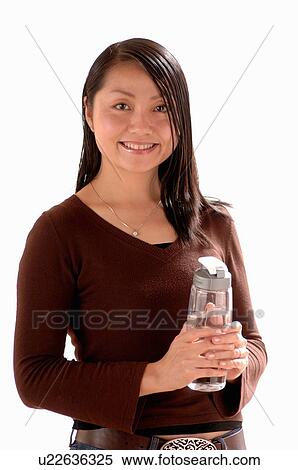 Asian Young girl w/water bottle, Regina, Saskatchewan View Large Photo Image Stock Photography - Asian Young girl w/water bottle, Regina, Saskatchewan. Fotosearch