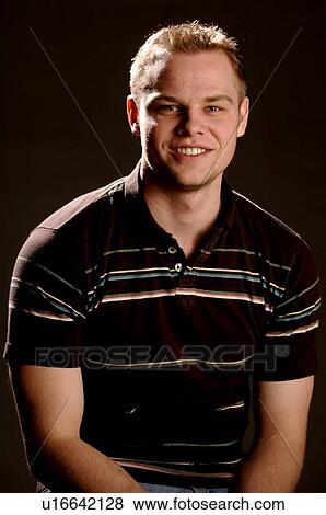Portrait of young man (21 years of age); Canada, Saskatchewan, Regina View Large Photo Image Stock Photo - Portrait of young man (21 years of age); Canada, Saskatchewan, Regina. Fotosearch
