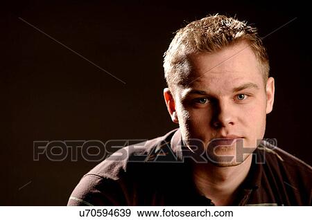 Stock Photo - Portrait of young man (21 years of age); Canada, Saskatchewan, Regina. Fotosearch