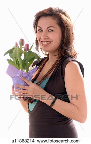 Picture - Young girl w/Flower, Regina, Saskatchewan. Fotosearch