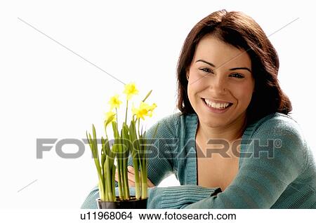 Young girl w/Flower, Regina, Saskatchewan View Large Photo Image Picture - Young girl w/Flower, Regina, Saskatchewan. Fotosearch