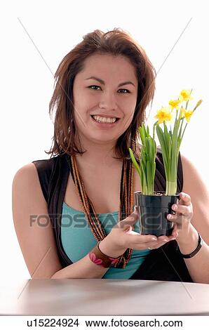 Picture - Young girl w/Flower, Regina, Saskatchewan. Fotosearch