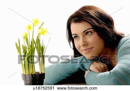 Young girl w/Flower, Regina, Saskatchewan View Large Photo Image Stock Image - Young girl w/Flower, Regina, Saskatchewan. Fotosearch