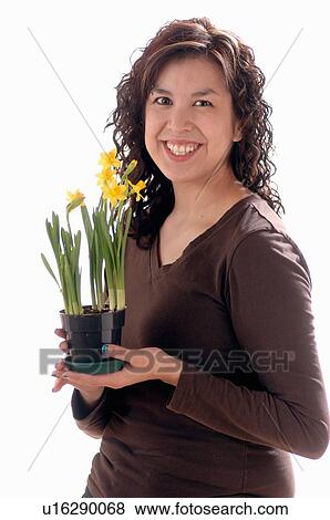 Young girl w/Flower, Regina, Saskatchewan View Large Photo Image Stock Photo - Young girl w/Flower, Regina, Saskatchewan. Fotosearch