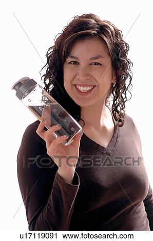 Stock Image - Young girl w/water bottle, Regina, Saskatchewan. Fotosearch