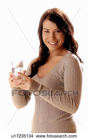 Picture - Young girl w/water glass, Regina, Saskatchewan. Fotosearch