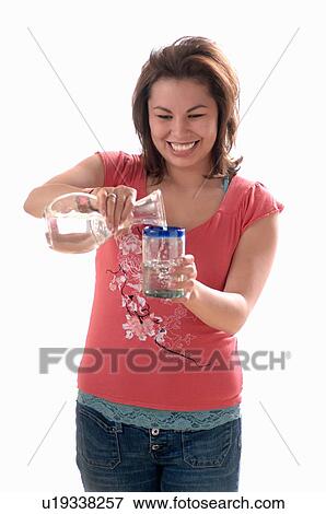 Young girl w/water pouring, Regina, Saskatchewan View Large Photo Image Stock Photo - Young girl w/water pouring, Regina, Saskatchewan. Fotosearch