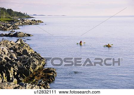 View of kayak on St. Lawrence River. Bas-Saint-Laurent region, Quebec, Canada View Large Photo Image Stock Image - View of kayak on St. Lawrence River. Bas-Saint-Laurent region, Quebec, Canada. Fotosearch