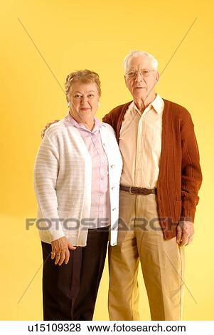 Senior couple posing; Canada, Saskatchewan, Regina View Large Photo Image Stock Photo - Senior couple posing; Canada, Saskatchewan, Regina. Fotosearch