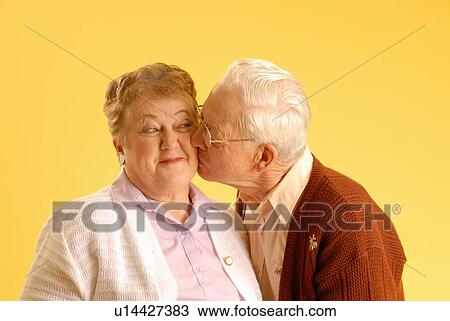 Stock Image - Senior couple posing, Regina, Saskatchewan. Fotosearch