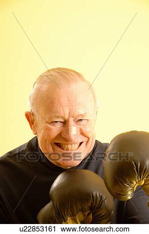 Senior male boxing gloves, Regina, Saskatchewan View Large Photo Image Stock Image - Senior male boxing gloves, Regina, Saskatchewan. Fotosearch