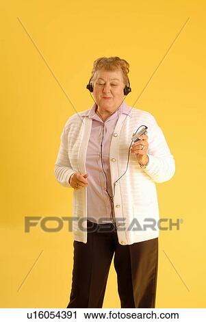 Senior Woman headphones, Regina, Saskatchewan View Large Photo Image Stock Image - Senior Woman headphones, Regina, Saskatchewan. Fotosearch
