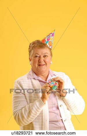 Senior Woman party hat; Canada, Saskatchewan, Regina View Large Photo Image Stock Image - Senior Woman party hat; Canada, Saskatchewan, Regina. Fotosearch