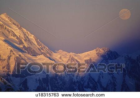 Moon over ridge of Mt Vancouver with the shadow of Mt. Logan View Large Photo Image Stock Image - Moon over ridge of Mt Vancouver with the shadow of Mt. Logan. Fotosearch