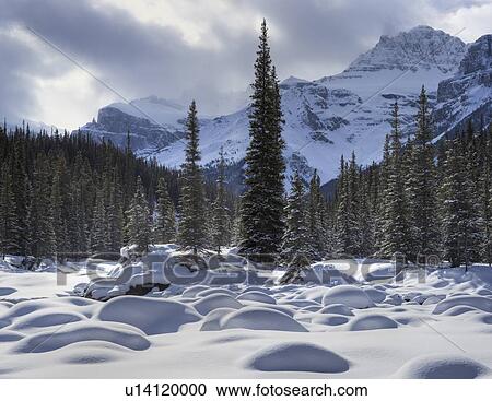 Stock Image - Mount Sarbach and the Mistaya River - Banff National Park - Alberta. Fotosearch