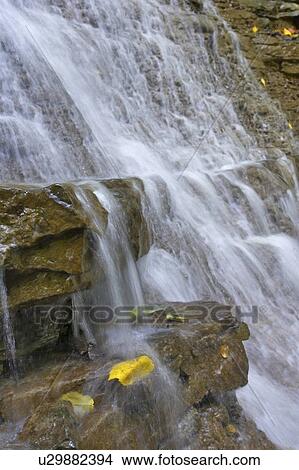 Detail of a water falling over rocky ledge, Canada, Ontario, Hamilton View Large Photo Image Picture - Detail of a water falling over rocky ledge, Canada, Ontario, Hamilton. Fotosearch
