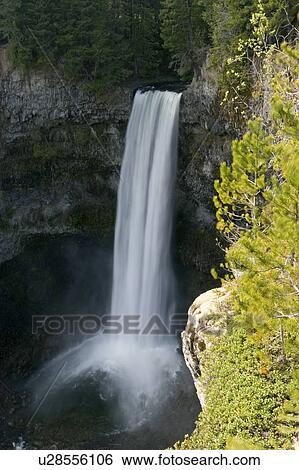 Stock Photograph - Scenic Brandywine Falls located near Whistler, British Columbia, off Sea to Sky Highway.. Fotosearch