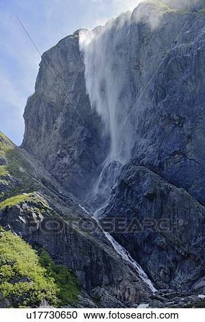 Stock Image - View of fall at Western Brook Pond, Gros Morne NP, Newfoundland, Canada. Fotosearch