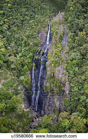 Stock Photograph - Waterfall in New Caledonia, (located almost directly between Australia and Fiji).. Fotosearch