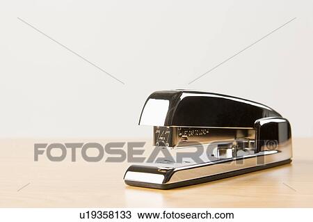 Stock Image - A Silver Stapler. Fotosearch