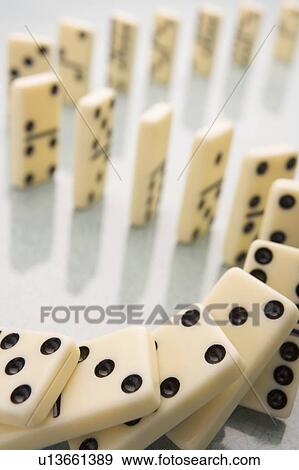 Arrangement Of Domino Pieces Collapsing View Large Photo Image Stock Photo - Arrangement Of Domino Pieces Collapsing. Fotosearch