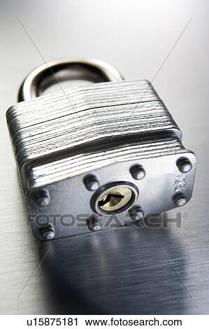 Stock Image - Close-Up Of Silver Padlock. Fotosearch
