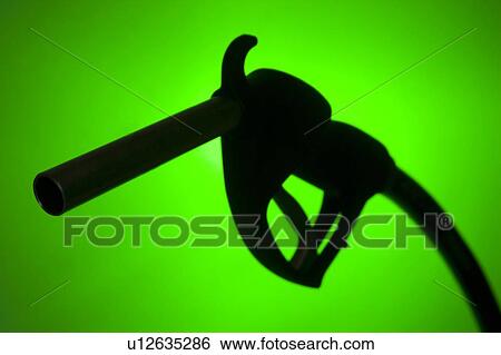 Stock Photograph - Fuel Pump Silhouette Against A Green Background. Fotosearch