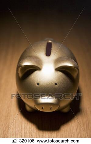 Stock Photograph - Golden Piggy Bank. Fotosearch