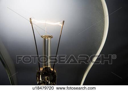 Stock Image - Illuminated Light Bulb. Fotosearch