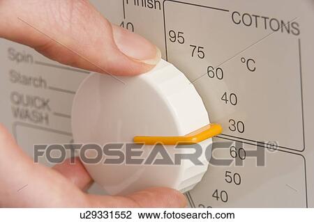 Person Adjusting Washing Machine Dial To Cold Wash View Large Photo Image Stock Image - Person Adjusting Washing Machine Dial To Cold Wash. Fotosearch