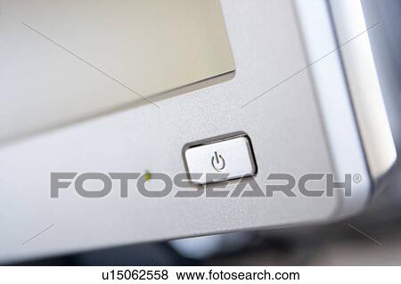 Shot of a power button on a computer monitor View Large Photo Image Stock Photo - Shot of a power button on a computer monitor. Fotosearch