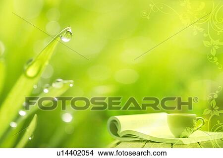 Stock Illustration - A cup beside an opened book and leave with dew (composite). Fotosearch