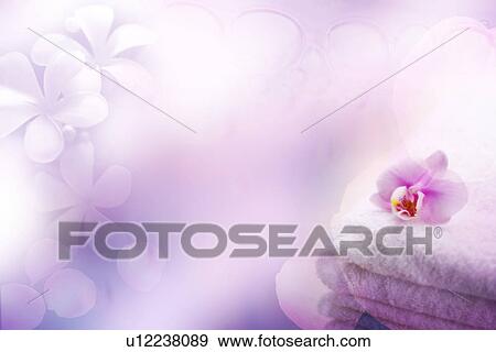 Stock Illustration - A flower on the folded towel (composite). Fotosearch