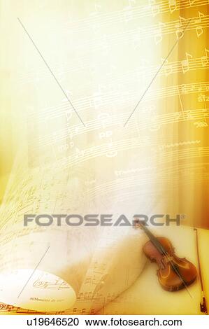 Clipart - A violin with the music book in background (composite). Fotosearch