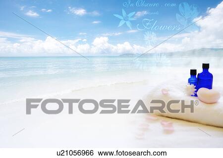 Aromatherapy oil, heart-shaped soap and towel at beach in clear sky(composite) View Large Illustration Stock Illustration - Aromatherapy oil, heart-shaped soap and towel at beach in clear sky(composite). Fotosearch