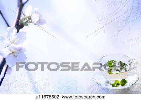 Drawing - Green leaves floating on a cup of water and peach blossom in background (composite). Fotosearch