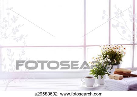 Drawing - Two potted plants with a cup of tea and folded towels with brush and soap on top (composite) by window. Fotosearch