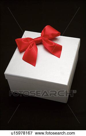 Close-up of a red bowknot on the box View Large Photo Image Stock Photo - Close-up of a red bowknot on the box. Fotosearch